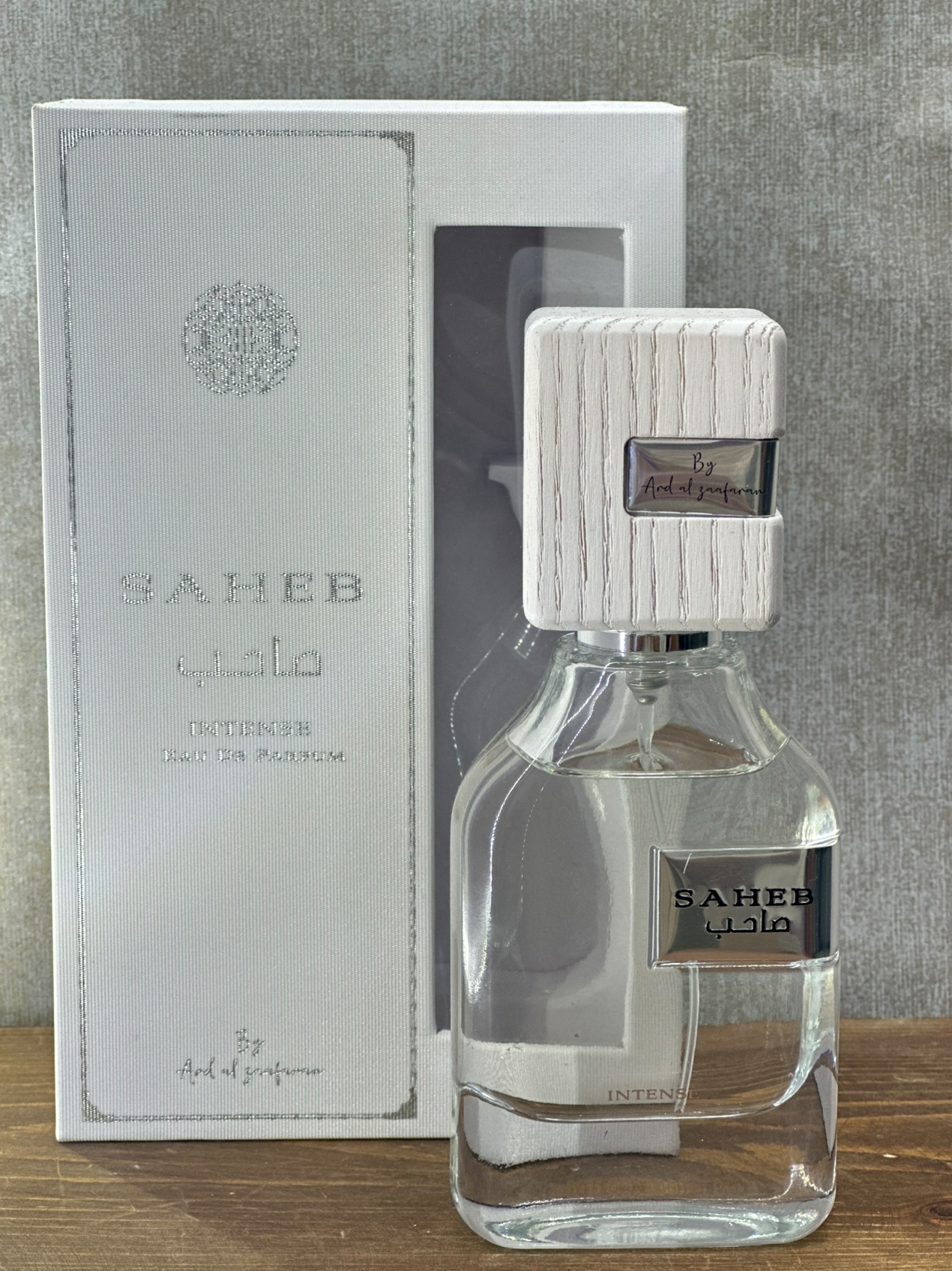 عطروادکلن مردانه  ادکلن صاحب اینتنس سفید ارض الزعفران مشابه لویی ویتون ایمجینیشن ۷۰ میل